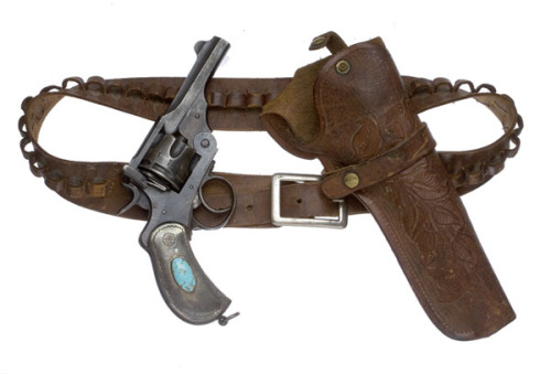 A British Webley revolver decorated with Navajo silver and turquoise.  Complete with leather rig. La