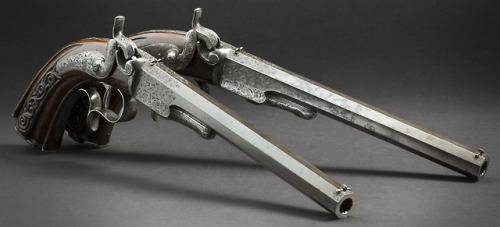 A pair of engraved breechloading percussion pistol crafted by Perrin Le Page of Paris, dated 1844.fr