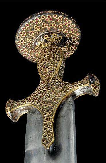 art-of-swords:Tulwar SwordDated: 1700Culture: Mughal, IndianMedium: iron, ruby, gold, silver, velvet