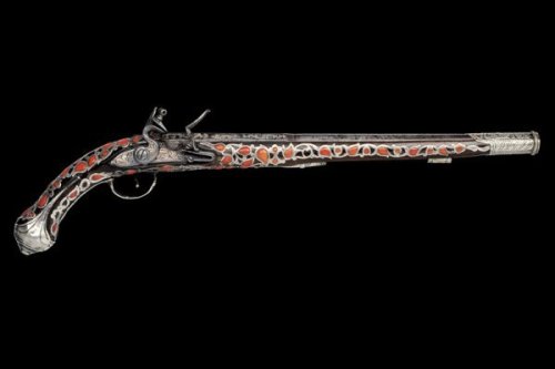 Silver and coral mounted flintlock pistol originating from Algeria, 19th century.Estimated Value: €3