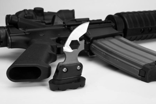 igunsandgear:  Tactical knife that fits in A2 grip. 
