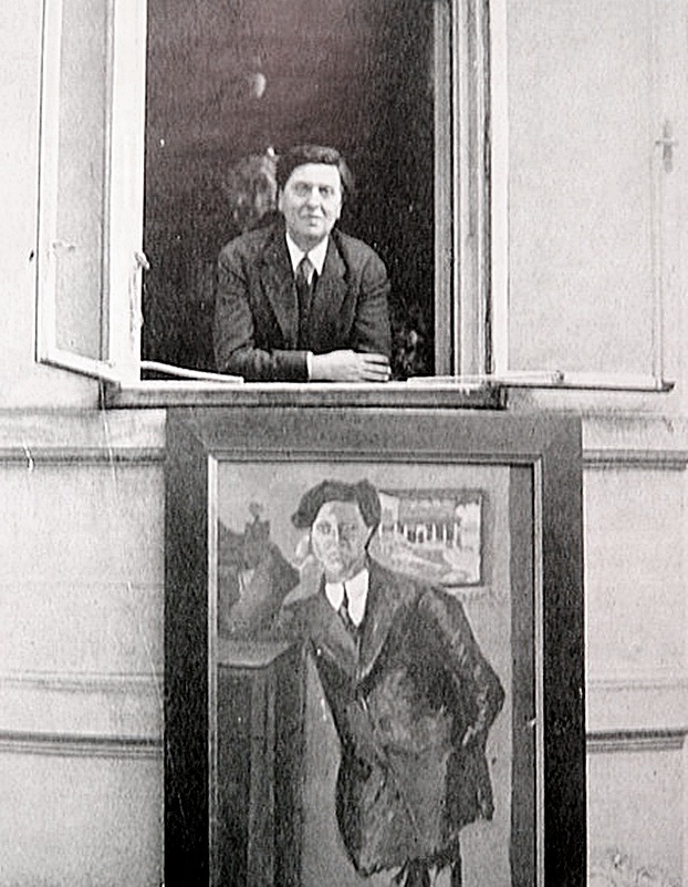 a) Austrian composer Alban Berg (Vienna 1885 - 1935) leans out of the window of his