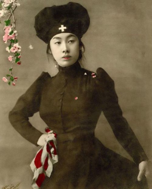 victorianchap:Colourised photo of Japanese nurse dressed in black c 1905.#colourised #japan #oldphot