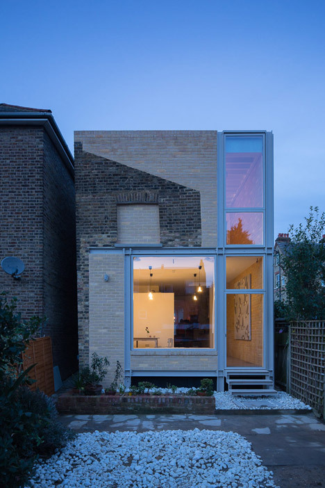 dezeen:  This remodelled London house extension was designed to reveal the outline of its predecessor »