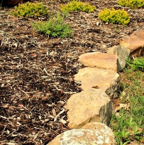 Natural Stone Pavers DallasPhoto Of A Large Traditional Partial Sun Front Yard Stone Landscaping In Spring.