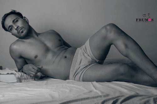 Hunk on Bed