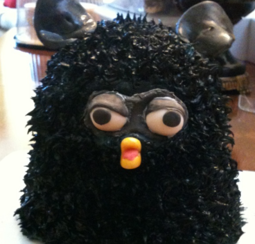 arcadefurbz:  turings:  turings: raw emotion captured through the medium of furby cakes   If u eat 1(one) frosting strand of his fur u will learn ALL the secrets of furby kind. 