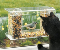 awesomeshityoucanbuy:  One Way Mirror Bird FeederBring your love of bird watching to your living room window with the one way mirror bird feeder. This transparent feeder holds approximately one pound of bird seeds and lets you get up close and personal