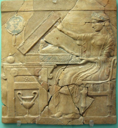 Pinax showing Persephone opening the so-called liknon mystikon, used in mystery rites.  Artist 