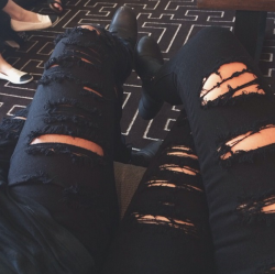 youthgreed:  Black ripped skinny jeans.99