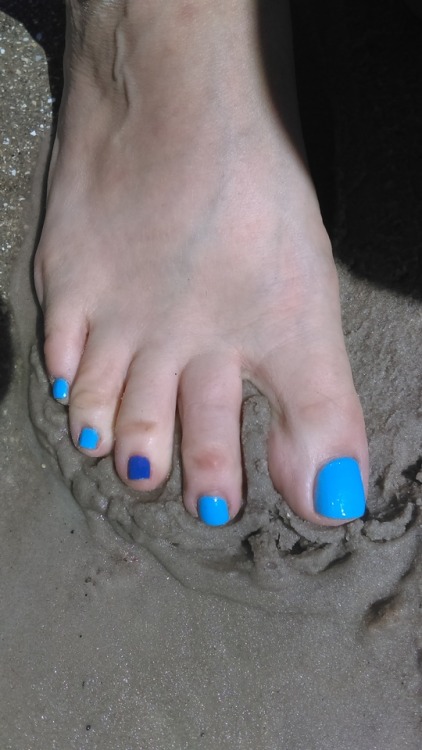 Squishing my toes in the sand, so love to do that!