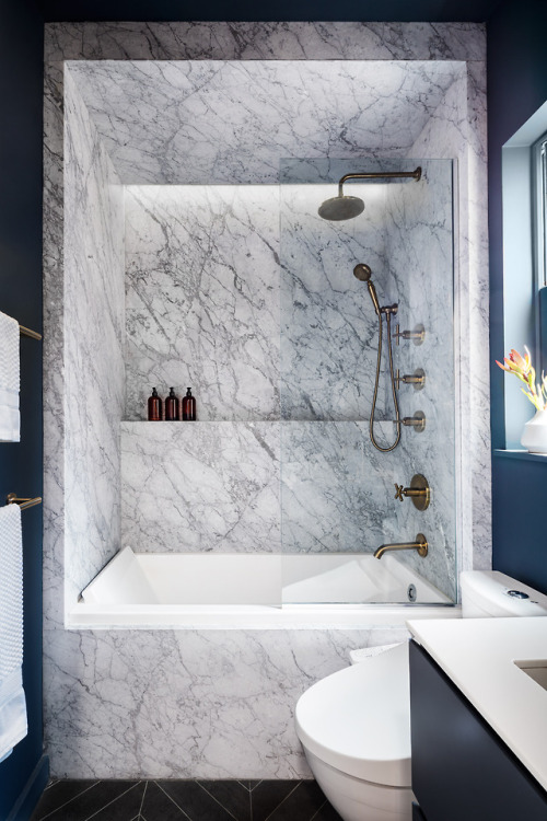 stylish-homes:Tub and shower clad in marble in an overhauled Upper East Side apartment, Manhattan, N