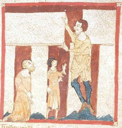 A giant helps Merlin build Stonehenge. From a manuscript of the Roman de Brut by Wace in the British