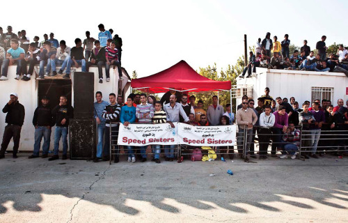 5centsapound:  Tanya Habjouq: Ladies Who Rally *This photo series is from a few years earlier, but Al Jazeera posted an article on the ‘Speed Sisters’ today.   Ramallah, Occupied West Bank - Hundreds of people have gathered along a closed-off street