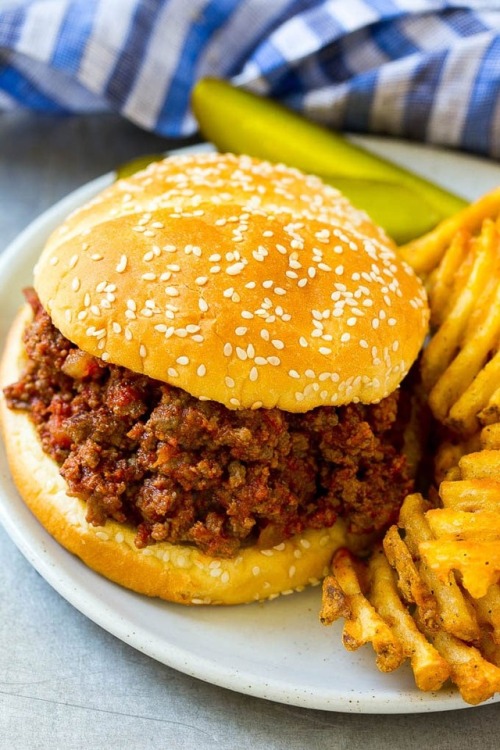 foodffs: These slow cooker sloppy joes are made with ground beef, tomato sauce, brown sugar and spic