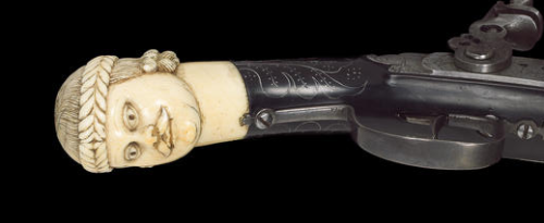 A German flintlock pistol with Dutch style carved ivory butt.Sold at Auction:  £34,800 (US$ 56,379)
