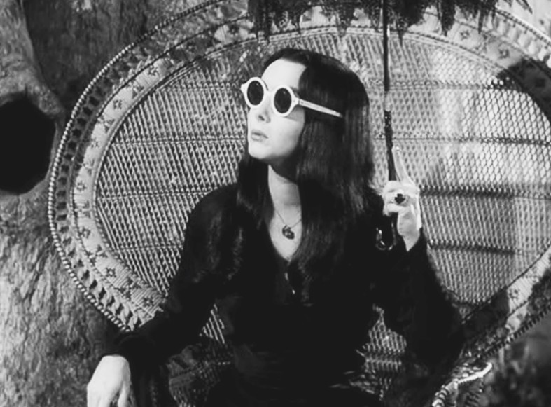 Carolyn Jones as Morticia Addams