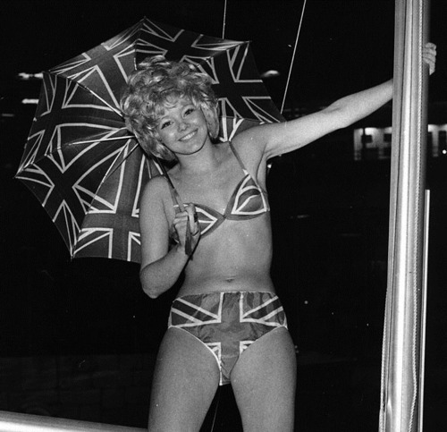 Bikini and umbrella designed by Renee PezaroBoat show in Earl’s Court, London, 1968