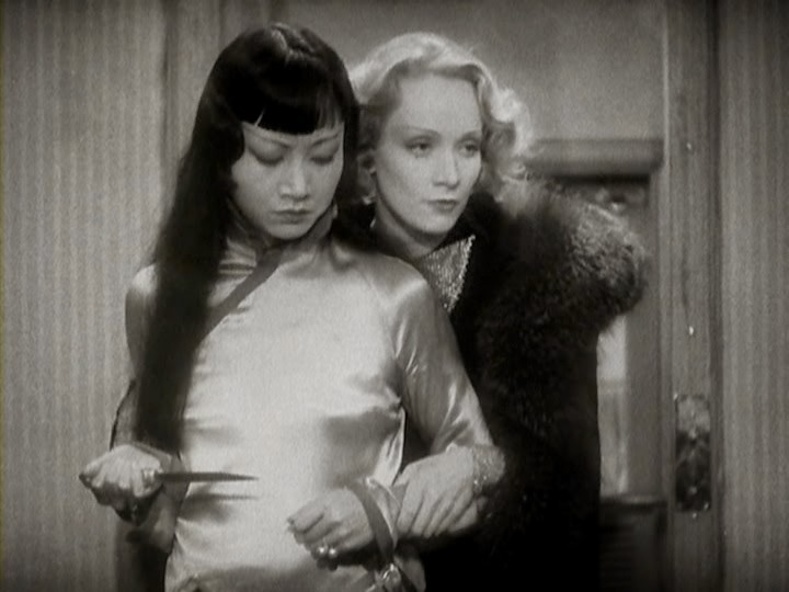 wehadfacesthen:  Marlene Dietrich and Anna May Wong in Shanghai Express  (Josef