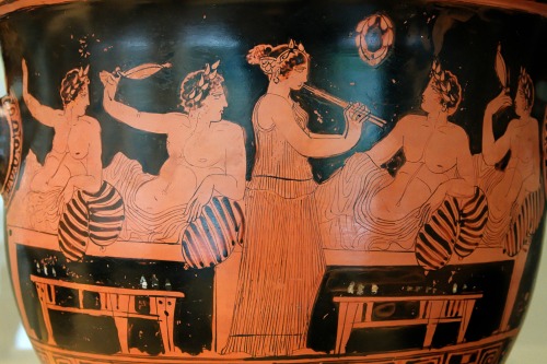 sporadicq:A female aulos-player entertains men at a symposium on this Attic red-figure bell-krater, 