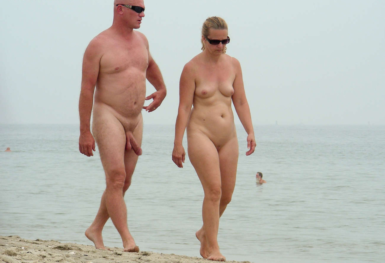 Mixed gender nude groups beach