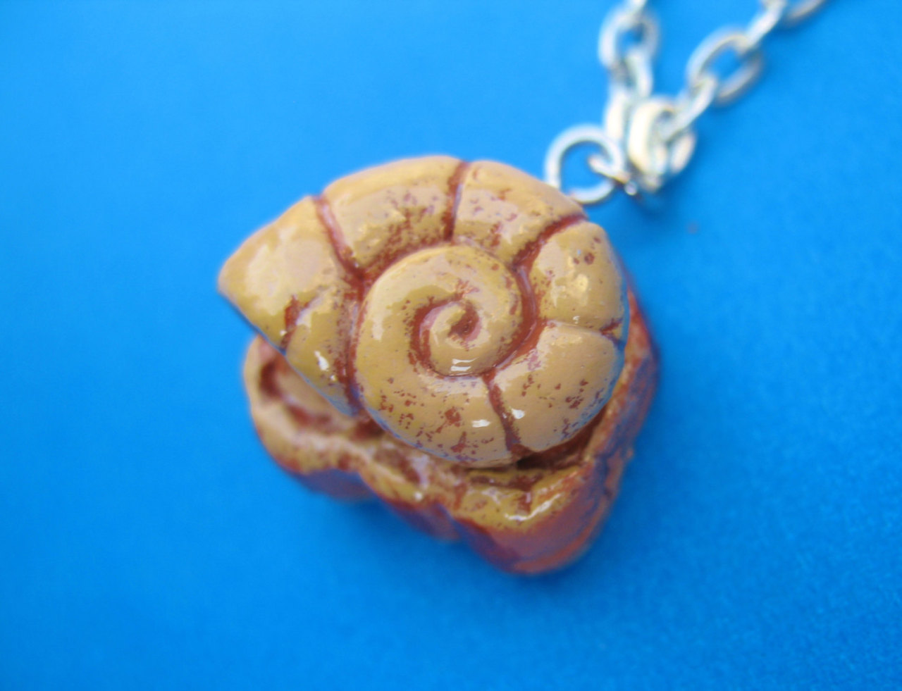 wickedclothes:  Twitch Plays Pokemon Helix Fossil Necklace Keep the helix fossil