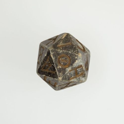 Egyptian twenty-sided die, 2nd C BCE-4th C CE. The sides of the die are marked with Greek letters. I