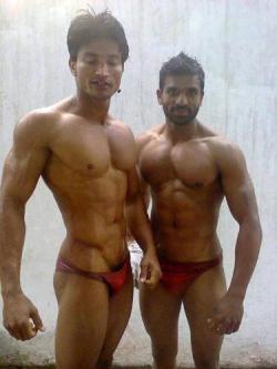 Two very handsome, muscular looking men - Physically ideal for me! WOOF