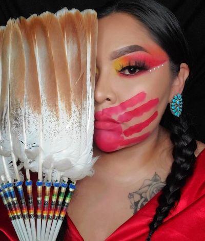 too-hot-to-hoot:Bodypaint by Diné makeup artist Tabby. The red handprint over the