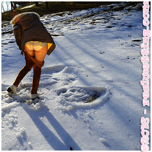 Having fun in the snow, making angels and pissing in brown pants, panties and boots.