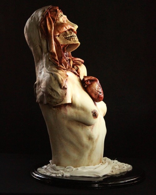 ex0skeletal-undead:Memorare sculpture by Emil MelmothThis artist on Instagram