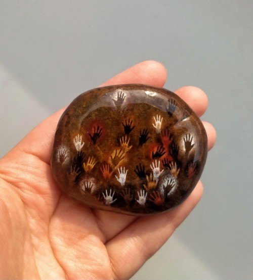 A Bigger Decorative Piece With Cave Painting Handprints. River Pebble And Tempera
