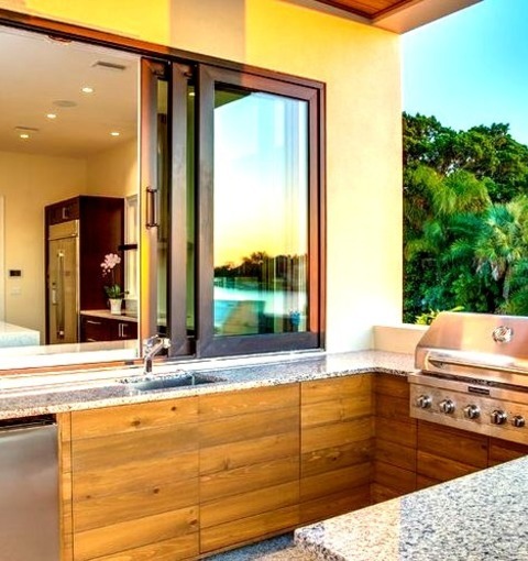 Tampa Backyard PorchThis Is An Illustration Of A Sizable Modern Porch With A Roof Extension.