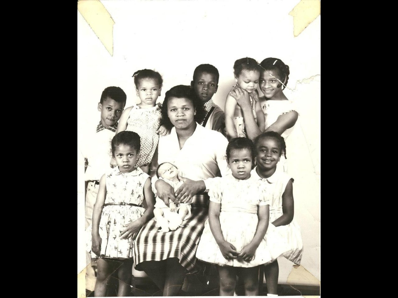 rachelstewartjewelry:  My grandmother. My dad on the far left. She eventually had