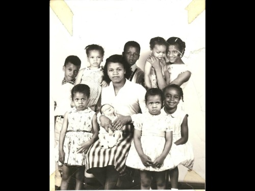 rachelstewartjewelry:  My grandmother. My dad on the far left. She eventually had 14 children. My great grandfather was a preacher who tried to organize blacks in the south, because of this the klan burned down their home and later tried to kill them