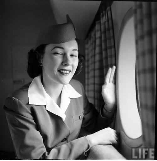 Stewardess prepares for trans-Atlantic commercial flight(Peter Stackpole. 1952)