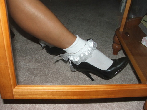 the mrs. showing off her great legs and frilly socks and heels