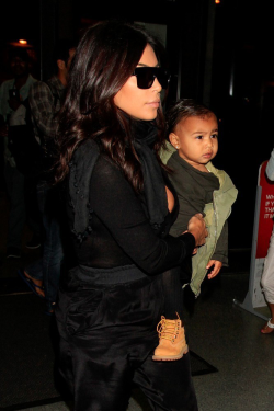 kimkardashianfashionstyle:  August 30, 2014 - Kim Kardashian &amp; North West at LAX Airport.