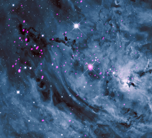 cosmicvastness: Starry night4,000 light years from Earth, the Lagoon Nebula is seen with its swirlin