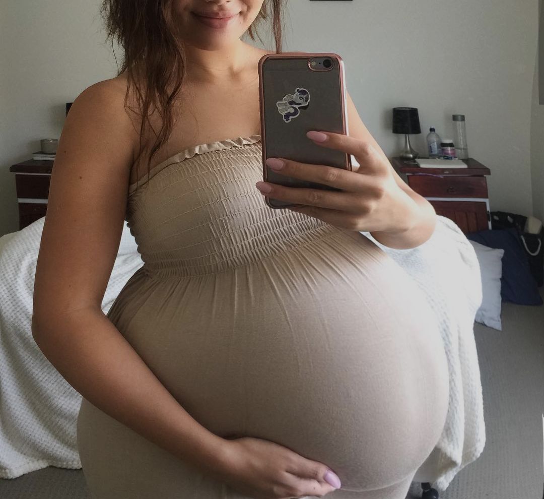 bestbellygirl:  I feel so huge here. I love rubbing my belly so much and i love being