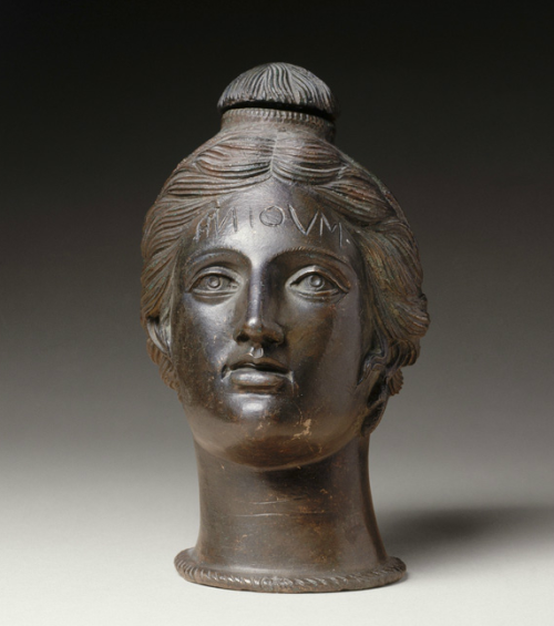 via-appia:Vase in the form of a woman’s head, contained ointment for funerary purpose, inscribed Sut