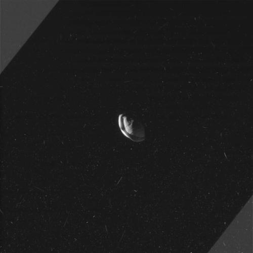 explorationimages: Cassini: Saturn’s tiny moon Pan, March 7th 2017. Pan orbits in the Encke Ga