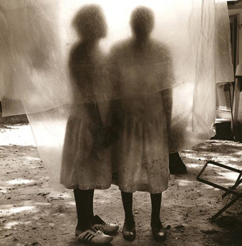 Istmos:  Jack Spencer, “Gladys And Her Mother Behind Clothesline”, Cove City,