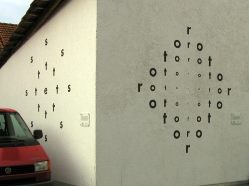 visual-poetry:  hünfeld is a town in germany with more than 100 concrete poems on house fronts. “das offene buch in hünfeld” 