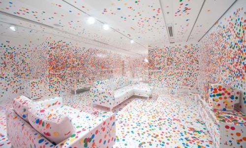 exxxmilitary:  The Obliteration Room - Yayoi Kusama (2012)  Yayoi Kusama constructed a beautiful yet simple domestic environment complete with a piano, a table, chairs, and other household decorations in a brilliant white at the Queensland Gallery of