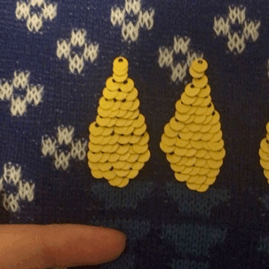 the-real-seebs: radarsteddybear:     LOOK WHO FINALLY FOUND HERSELF A HANUKKAH SWEATER!!!