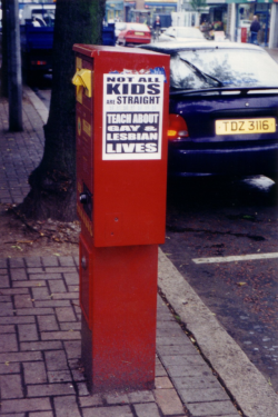 lesbianherstorian:“NOT ALL KIDS ARE STRAIGHT. TEACH ABOUT GAY &amp; LESBIAN LIVES”, a poster from the lesbian avengers in belfast, ireland, photographed by maxine wolfe, 1998