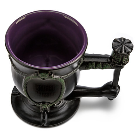 disneyshopping:  The Haunted Mansion Sculpted Mug Get a handle on your fears with this Haunted Mansion Sculpted Mug. Finely detailed with elements inspired by the décor at the frightfully popular attraction, this ceramic cup is guaranteed to raise your