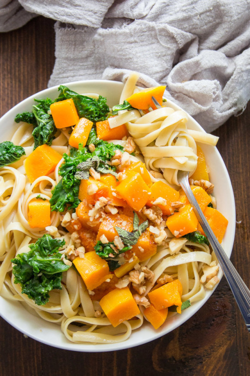 This hearty butternut squash pasta is made with a light white wine sauce, tender kale, and chunks of