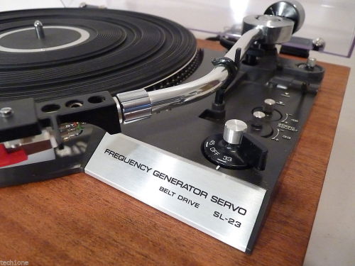 Technics SL-23 - Restored One Of A Kind Auto Return Turntable.   A true classic one of a kind turntable by Technics, model SL-23. The turntable has been restored to better than original condition. The base had the gray vinyl covering removed and real